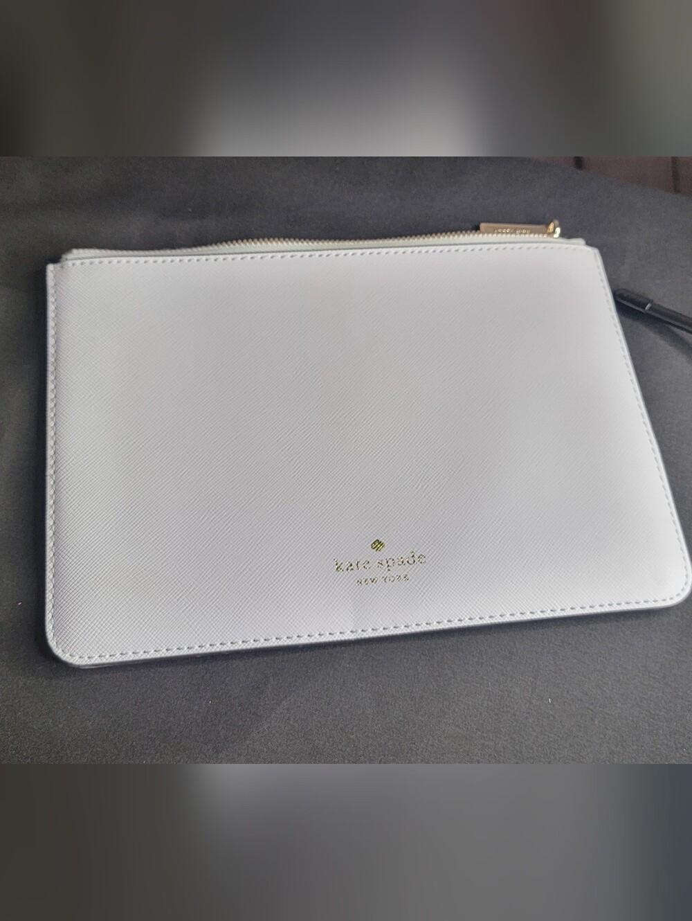 kate spade Light Blue leather pouch with gold logo